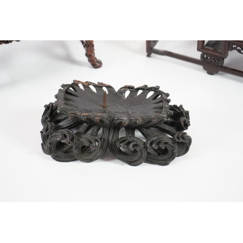 214 - Three Chinese carved wood stands, 19th/early 20th century the first a model of an altar table with m... 