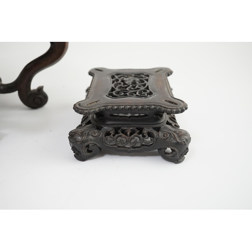 215 - A large Chinese hongmu vase stand and a rectangular hongmu fangding censer stand, late 19th century,... 