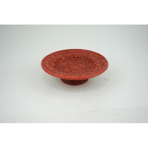 227 - An unusual Chinese cinnabar lacquer thousand flower footed dish, 18th/19th century, finely carved ... 