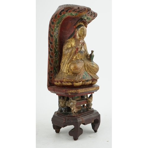 229 - A Chinese polychrome and giltwood seated figure of Guanyin, Guangxu period inscription for the first... 