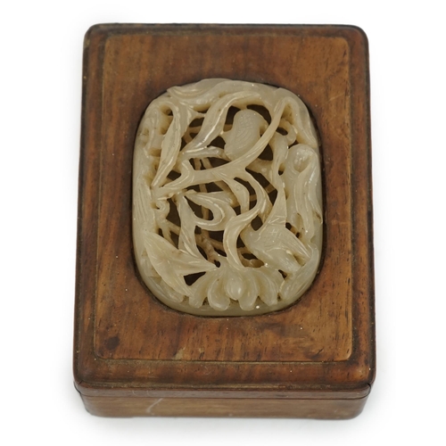 232 - A Chinese pale creamy white jade egret and lotus plaque, Yuan-Ming dynasty, carved in high relief ... 