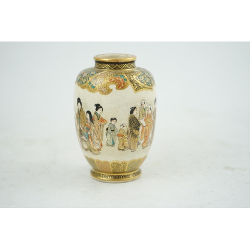 26 - A Japanese Satsuma small ovoid vase, Meiji period, painted with a procession of figures, within broc... 