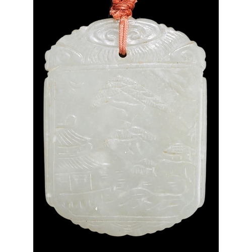 261 - An unusual Chinese pale celadon jade plaque, 19th century, carved to each side with the same scene o... 