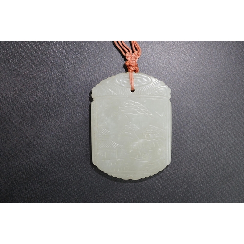 261 - An unusual Chinese pale celadon jade plaque, 19th century, carved to each side with the same scene o... 