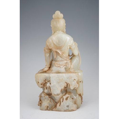 273 - An impressive Chinese white and calcified jade figure of a Bodhisattva, 20th century, the figure fin... 