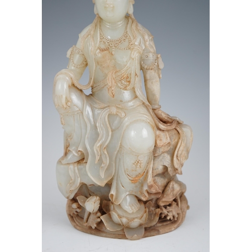 273 - An impressive Chinese white and calcified jade figure of a Bodhisattva, 20th century, the figure fin... 