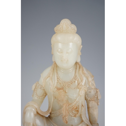 273 - An impressive Chinese white and calcified jade figure of a Bodhisattva, 20th century, the figure fin... 