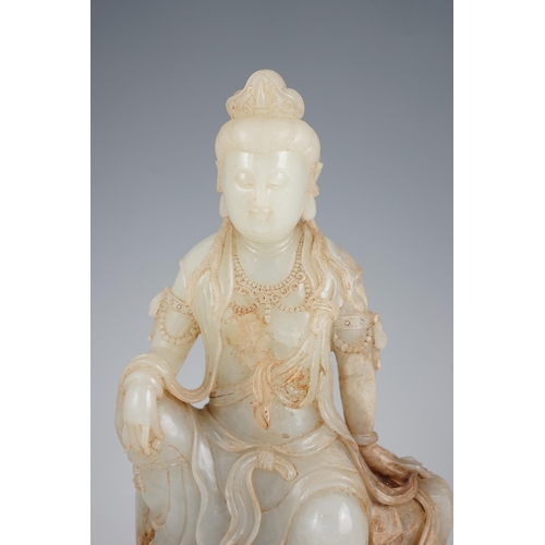 273 - An impressive Chinese white and calcified jade figure of a Bodhisattva, 20th century, the figure fin... 