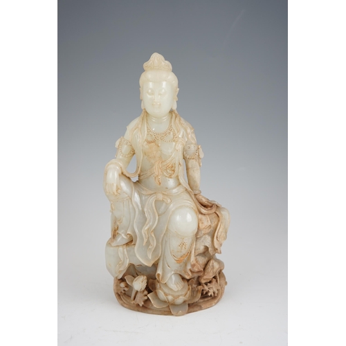 273 - An impressive Chinese white and calcified jade figure of a Bodhisattva, 20th century, the figure fin... 