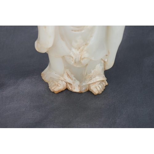 275 - A massive Chinese white and calcified jade standing figure of Buddha Shakyamuni, in Tang style, but ... 