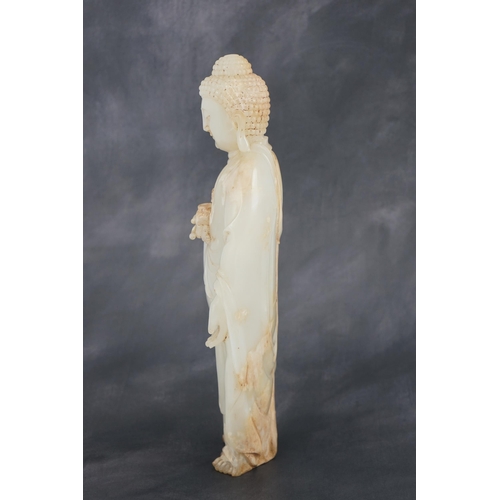 275 - A massive Chinese white and calcified jade standing figure of Buddha Shakyamuni, in Tang style, but ... 