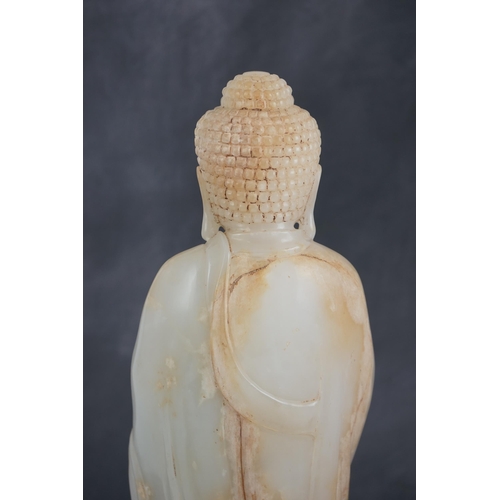 275 - A massive Chinese white and calcified jade standing figure of Buddha Shakyamuni, in Tang style, but ... 