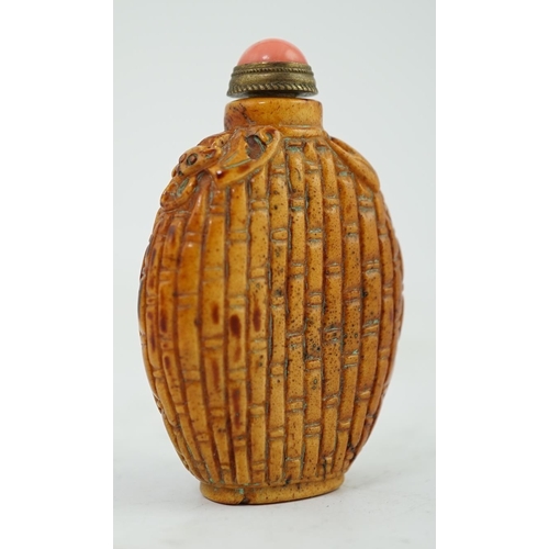 278 - A Chinese hardstone snuff bottle, 19th/20th century, carved in relief with bamboo canes, and a pair ... 