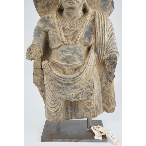 281 - A large grey schist Bodhisattva figure, Gandhara, 2nd/3rd century A.D., dressed in a flowing sangha... 