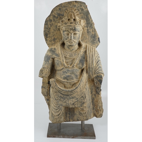 281 - A large grey schist Bodhisattva figure, Gandhara, 2nd/3rd century A.D., dressed in a flowing sangha... 