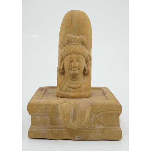 285 - A sandstone Ekamukha Shiva Linga and Yoni, Northwest India, 7th/8th century A.D., the Linga with the... 