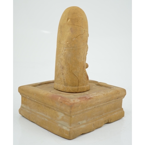 285 - A sandstone Ekamukha Shiva Linga and Yoni, Northwest India, 7th/8th century A.D., the Linga with the... 