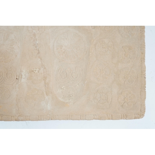 286 - A sandstone relief of Buddhas foot prints (Buddhapada), Southern India, 12th century, 37cmProvenanc... 