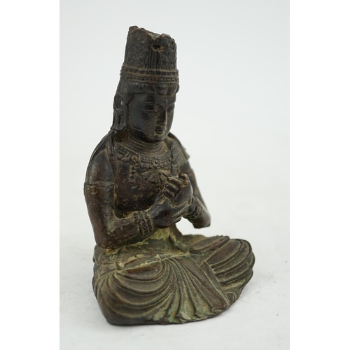 287 - A small South East Asian bronze seated figure of Vairocana Buddha, probably 17th/18th century, 9.5cm... 