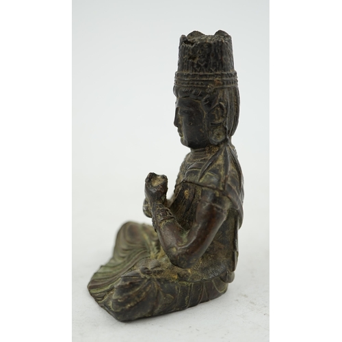 287 - A small South East Asian bronze seated figure of Vairocana Buddha, probably 17th/18th century, 9.5cm... 