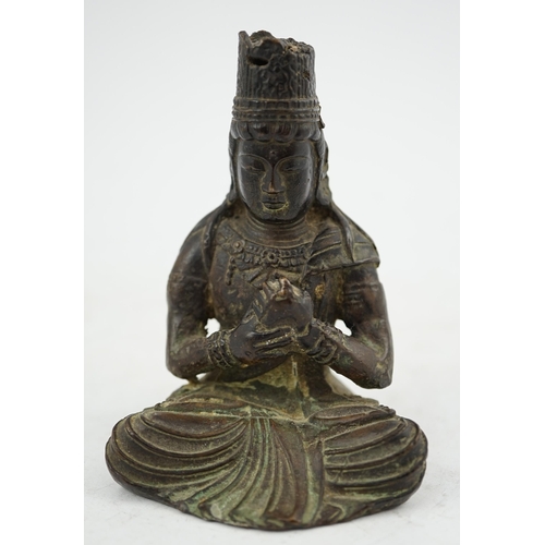 287 - A small South East Asian bronze seated figure of Vairocana Buddha, probably 17th/18th century, 9.5cm... 