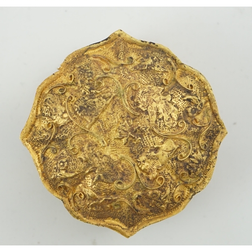 289 - A Chinese gilt metal repoussé work box and cover, Liao dynasty style, of petal lobed form, decorated... 