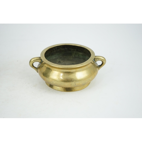 291 - A Chinese bronze censer, gui, Xuande mark, 18th/19th century, the bombé shaped body with a pair of l... 