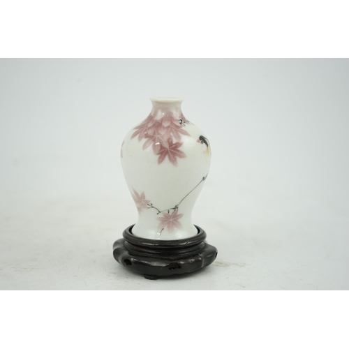 3 - Makuzu Kozan, a miniature baluster vase, c.1900-10, decorated with a finch seated on a maple branch,... 