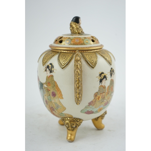 30 - the globular body applied with a pair of pierced gilt floral handles, the pierced domed cover surmou... 