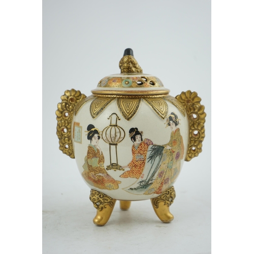 30 - the globular body applied with a pair of pierced gilt floral handles, the pierced domed cover surmou... 