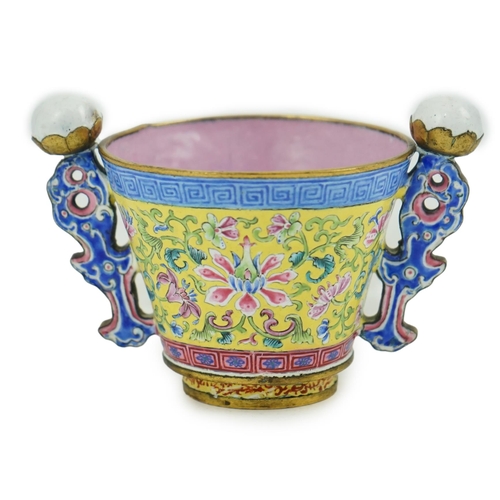 306 - A Chinese Guangzhou enamel two handled wine cup, four character Qianlong mark and of the period (173... 