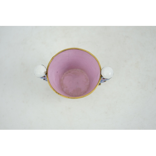 306 - A Chinese Guangzhou enamel two handled wine cup, four character Qianlong mark and of the period (173... 