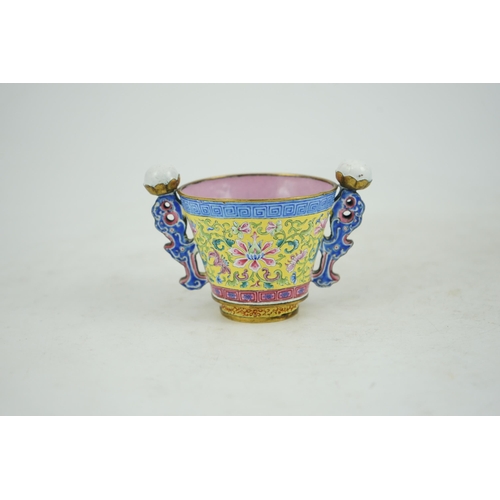 306 - A Chinese Guangzhou enamel two handled wine cup, four character Qianlong mark and of the period (173... 