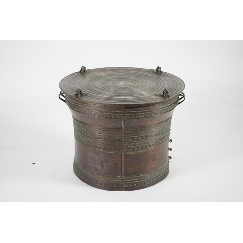 308 - A large Sino-Shan bronze rain drum, Shan States, East Burma, 19th century, the cast concentric ring ... 