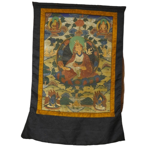 314 - A Tibetan painted silk thangka, depicting Padmadambhara seated on a throne of lotus petals, 19th cen... 