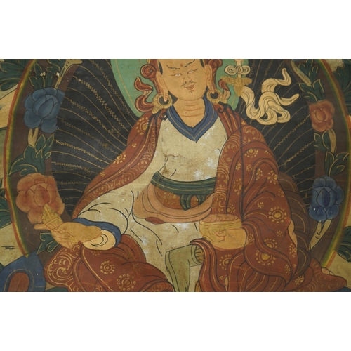 314 - A Tibetan painted silk thangka, depicting Padmadambhara seated on a throne of lotus petals, 19th cen... 