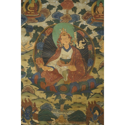 314 - A Tibetan painted silk thangka, depicting Padmadambhara seated on a throne of lotus petals, 19th cen... 