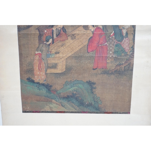 324 - Chinese School, 19th century, scroll painting, ink and colour on silk, scholars in a garden examinin... 