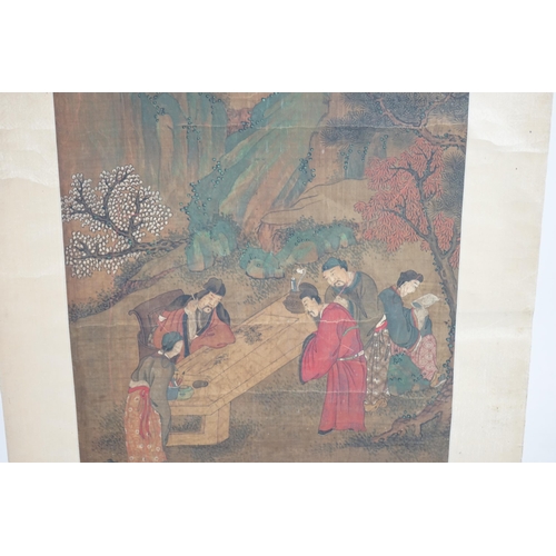 324 - Chinese School, 19th century, scroll painting, ink and colour on silk, scholars in a garden examinin... 