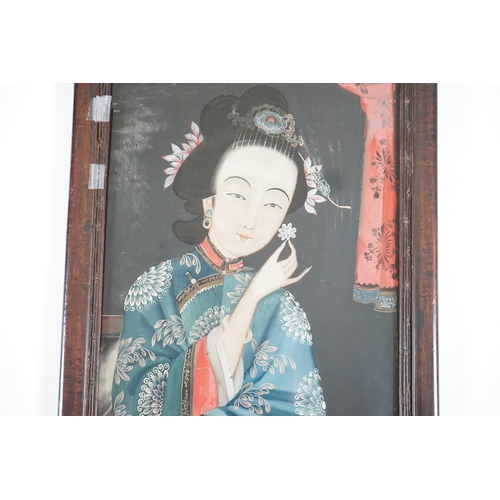 327 - A Chinese reverse painting on glass of a lady holding a flower, 19th century, image 49cm x 34cm, con... 