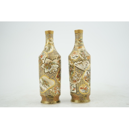 33 - A pair of Japanese Satsuma bottle vases, Meiji period, painted with shaped reserves of bijin, schola... 