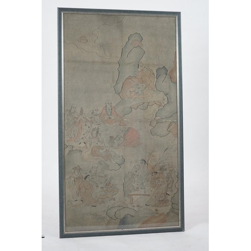 336 - A large Chinese Kesi eighteen luohan panel, 19th century, worked in colours and gold thread with t... 