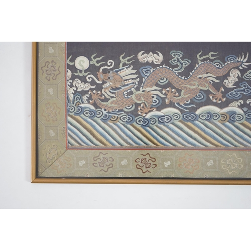 338 - A Chinese Kesi 'dragon' panel, 19th century, woven with four dragon roundels, above a five claw drag... 