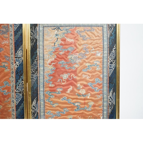 339 - A pair of Chinese coral silk dragon panels, 19th century, worked in polychrome silk and gold threa... 