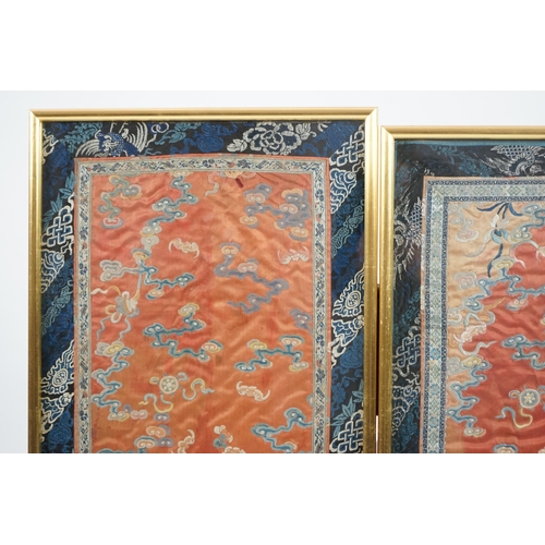 339 - A pair of Chinese coral silk dragon panels, 19th century, worked in polychrome silk and gold threa... 