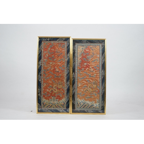 339 - A pair of Chinese coral silk dragon panels, 19th century, worked in polychrome silk and gold threa... 