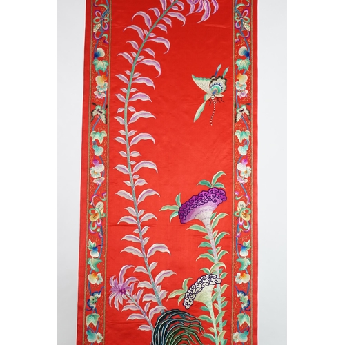 341 - A Chinese embroidered silk wall hanging, early 20th century, decorated with a chicken, insects and s... 