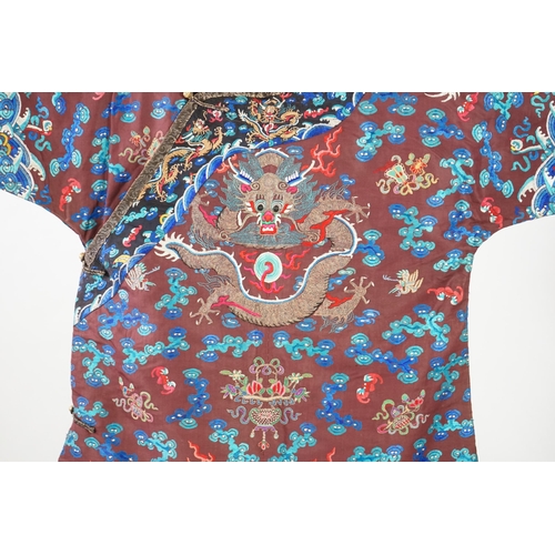 343 - A Chinese brown silk court robe for an Imperial Duke, jifu, late 19th century, embroidered to the br... 