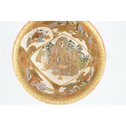 35 - A Japanese Satsuma rakan bowl, Meiji period, the exterior painted with rakan and attendants, the i... 