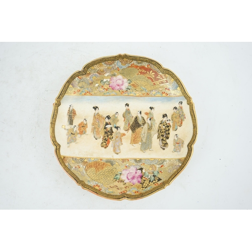 39 - A Japanese Satsuma barbed rim dish, Meiji period, painted to a rectangular reserve with a procession... 